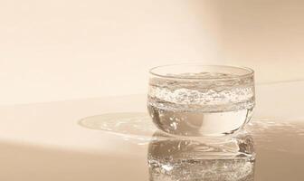 A glass of water with a few bubbles in it photo
