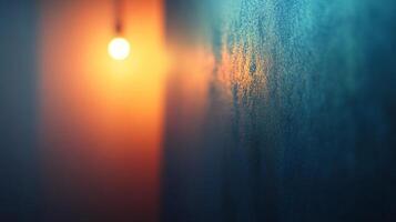 A light is shining on a wall with a blue background photo