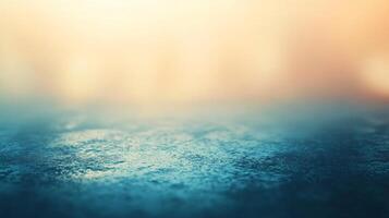 A blurry blue and yellow background with a few specks of color photo