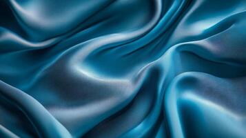 A blue fabric with a pattern of waves and ripples photo