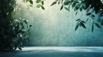 A tree with green leaves is in front of a wall photo