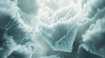 The image is of a cloud of ice crystals, with a blue and white color scheme photo