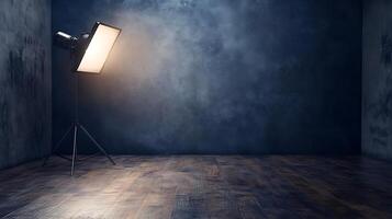 A dramatic, moody studio space with softbox lighting illuminating textured walls and a wooden floor, perfect for portrait photography. photo