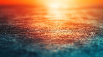 Abstract textured surface gradient from deep blue to warm orange tones, evokes a sense of transition, blending of elements and artistic expression photo
