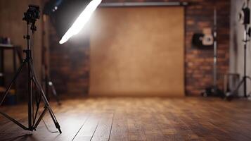 Photography studio with lighting and backdrop. The wooden floor and brick wall provide a rustic background for a photo shoot.