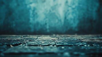 Textured teal background with cracked flooring, creating a moody and abstract scene. Ideal for design, art, or atmospheric visuals. photo