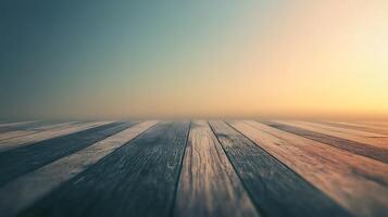 Wooden planks lead to a soft, diffused horizon under a gradient sky. An inviting platform with potential for a variety of uses. photo