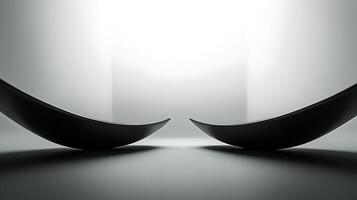 Abstract minimalistic composition featuring curved black elements on a glossy gray surface, set against a bright, gradient background. photo