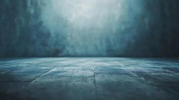 Moody interior scene with concrete floor and blurred background. Dramatic lighting and dark atmosphere. Perfect for product showcase. photo