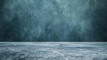 Minimalist abstract backdrop with a blue textured background and a smooth, textured surface for product placement or design element. photo