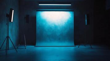 A photographic studio space bathed in an enchanting azure glow, featuring equipment and a backdrop, creating a vibrant and artistic ambiance. photo