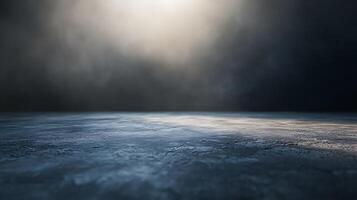 An abstract blue-gray textured surface, evoking a sense of solitude and possibility, against a dark backdrop with an atmospheric glow. photo