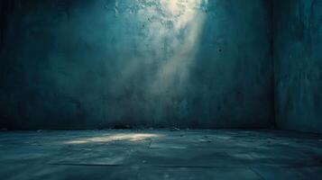 An interior corner with moody lighting. Sunlight pierces through an opening creating dramatic shadows on textured walls and stone floors. photo