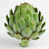 A large green artichoke with many leaves and a prominent stem. photo