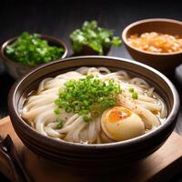 Japanese Udon Noodles with Soft Boiled Egg and Green Onions photo