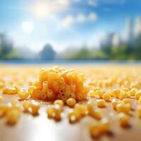 Pile of macaroni on a table with a blurry background photo