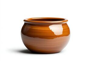A beautifully crafted ceramic pot, showcasing a rich, glossy finish. This versatile piece serves as a perfect decor item or functional container, ideal for home or garden use. photo