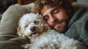 A man is sleeping with his dog photo
