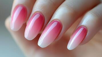 Elegant close-up of glossy French ombre nails photo