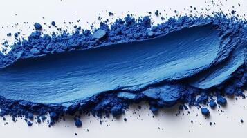 Vibrant Cobalt Blue Powder Spread on Bright White photo