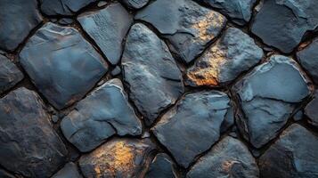 A stone wall with a black background photo