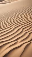 A crisp shot of wavy sand dunes, showcasing the fine texture of the sand and the soft shadows created by the dunes undulations. photo