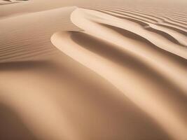 A close-up view of sand dune ripples, showcasing delicate textures and the subtle shadows formed by the curves. photo
