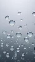 A macro image showing the randomness of condensation droplets as they form abstract shapes. photo