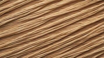 A high-resolution close-up of tightly interwoven natural straw fibers creating a geometric design. photo