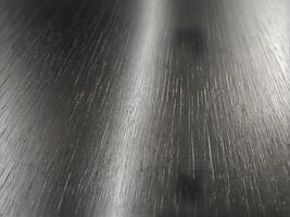 A macro view of stainless steel with soft, linear textures and a modern finish. photo