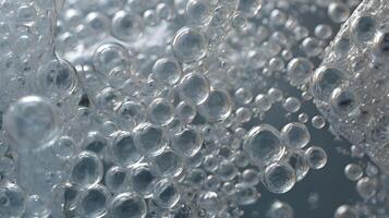 A sharp macro shot of plastic wrap, featuring bubbles of air that create an intricate surface pattern. photo