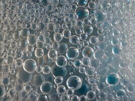 A detailed capture of plastic wrap with visible air bubbles, creating an intriguing texture. photo