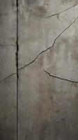 A textured shot of a rough concrete wall with small cracks and imperfections. photo