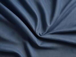 A high-resolution macro photograph of classic blue jeans fabric, emphasizing its weave pattern. photo