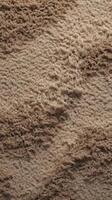 A high-definition close-up displaying the delicate wear of an old textile rug. photo
