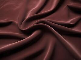 A moody velvet textile with deep coloring and a soft interplay of light. photo
