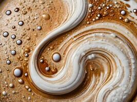 A high-resolution close-up of espresso foam, featuring its light bubbles and creamy texture. photo