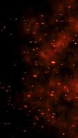 Abstract background with shining lights sparks and fireworks from particles Sparks in the Dark Firestorm texture Shot of flying fire sparks in the air video