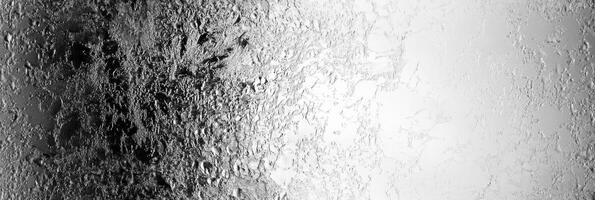 Abstract textured surface with metallic and reflective patterns for design concepts photo