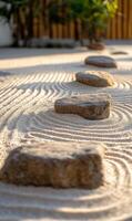 Zen garden footpath with stones and raked sand, tranquil scene evoking relaxation and mindfulness photo