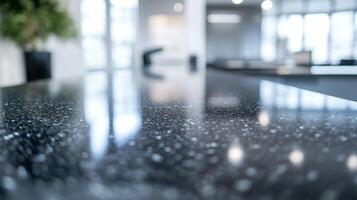 Abstract marble surface with speckled pattern reflecting light in a modern interior space photo