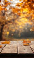 Autumnal Equinox, Wooden Table adorned with Deciduous Foliage against a blurred backdrop photo