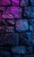 Illuminated stone facade with vivid gradient lights creating a modern aesthetic design photo