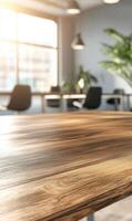 Sunlit workspace table focus, modern office interior with desk and blurred background photo