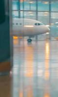 Abstract view of airplane at airport terminal reflects ambition of global travel plans photo