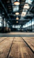 Rustic wooden tabletop, blurred factory backdrop, inviting warmth within industrial setting photo