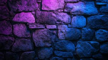 Textured stone wall illuminated with captivating neon blue and vibrant magenta hues photo