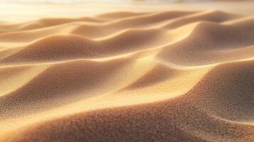 Golden textured background of desert sand dunes, beautiful sunlight, and peaceful waves photo