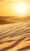 Golden desert landscape at sunrise showcasing endless sand dunes and warm color palette photo