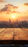 Panoramic cityscape sunset backdrop with aged wooden planks in the foreground detail photo